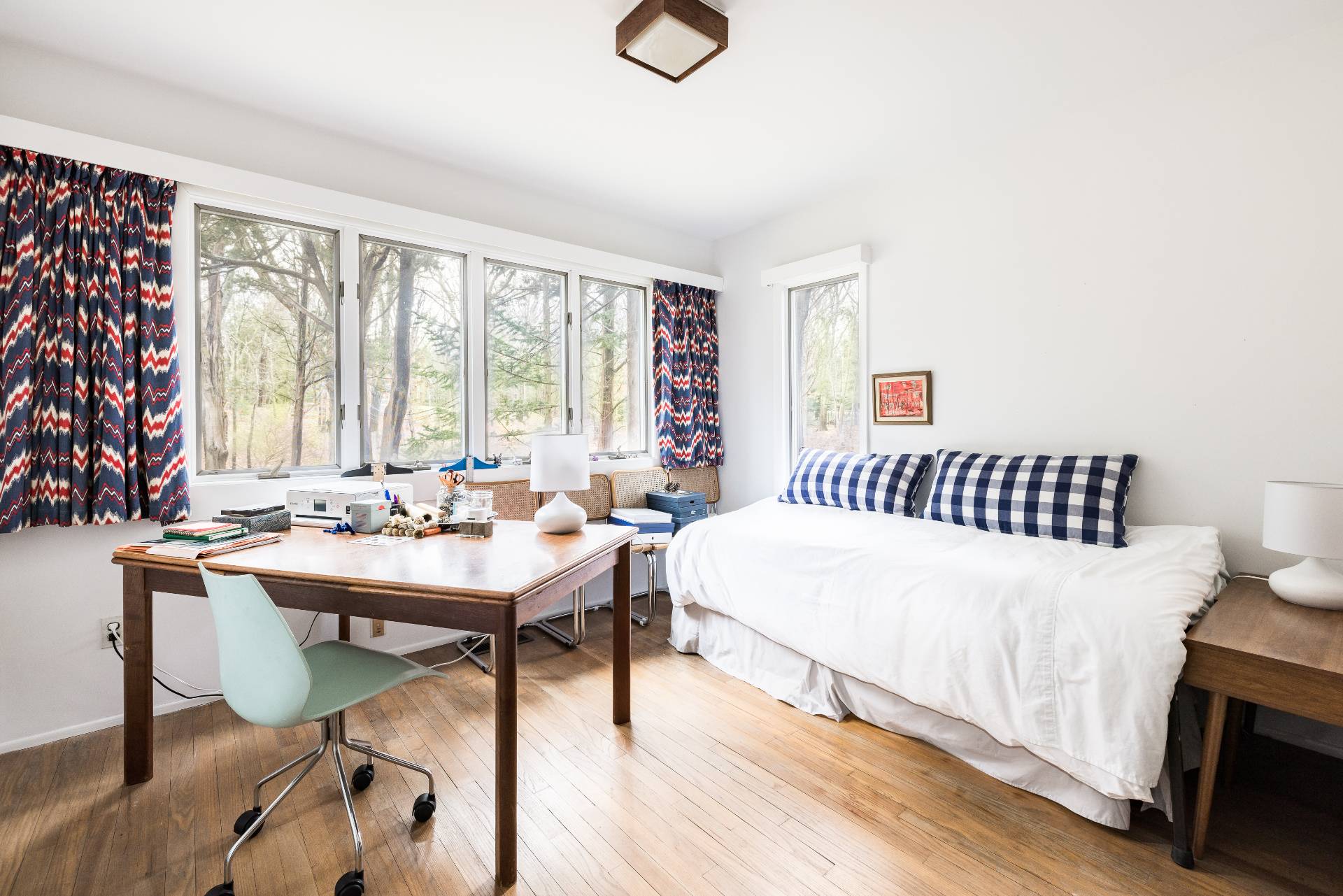 291 Three Mile Harbor Road East Hampton, NY 11937 - Photo 15 of 17 a bedroom with a bed and a table