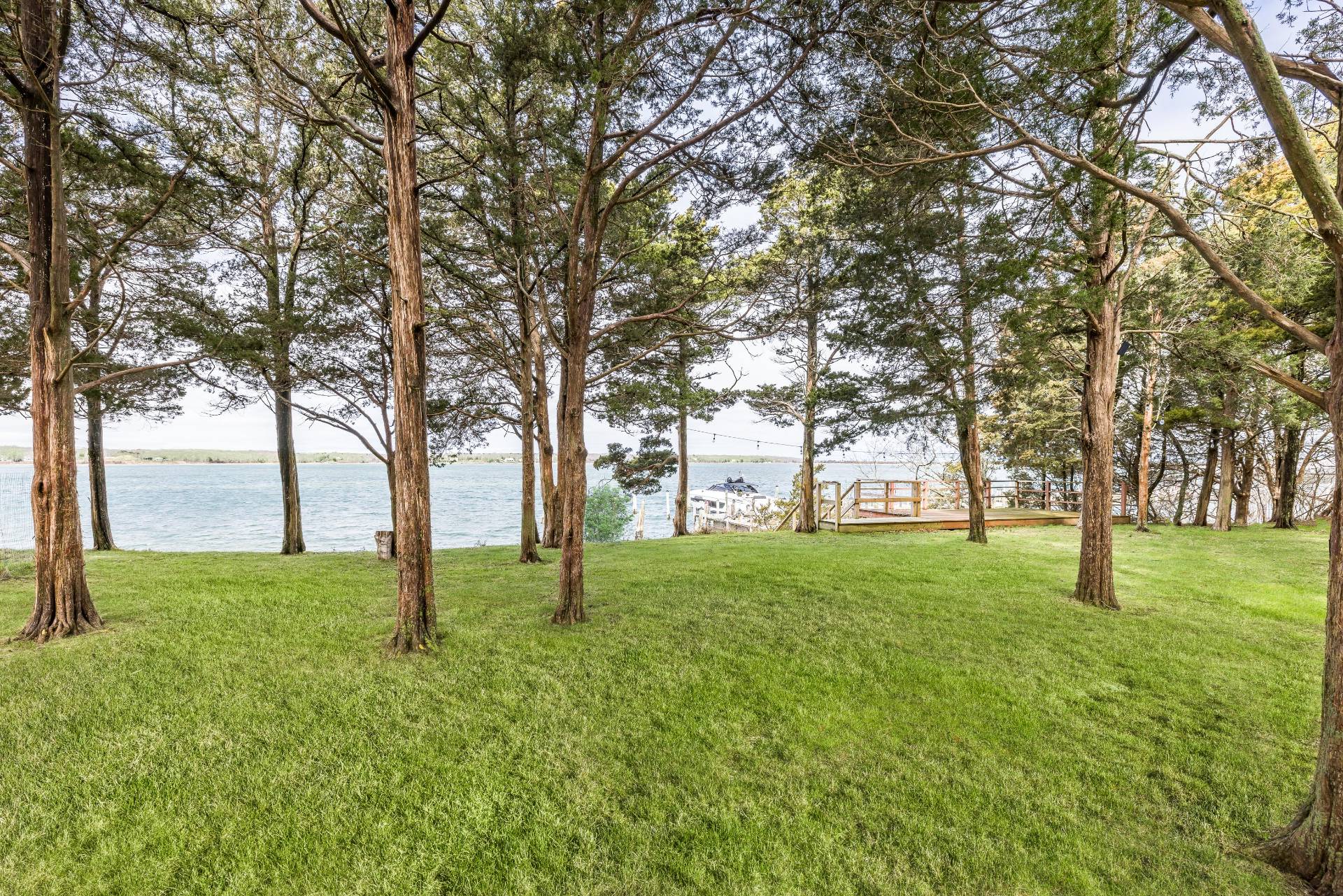 291 Three Mile Harbor Road East Hampton, NY 11937 - Photo 3 of 17 a view of yard with trees