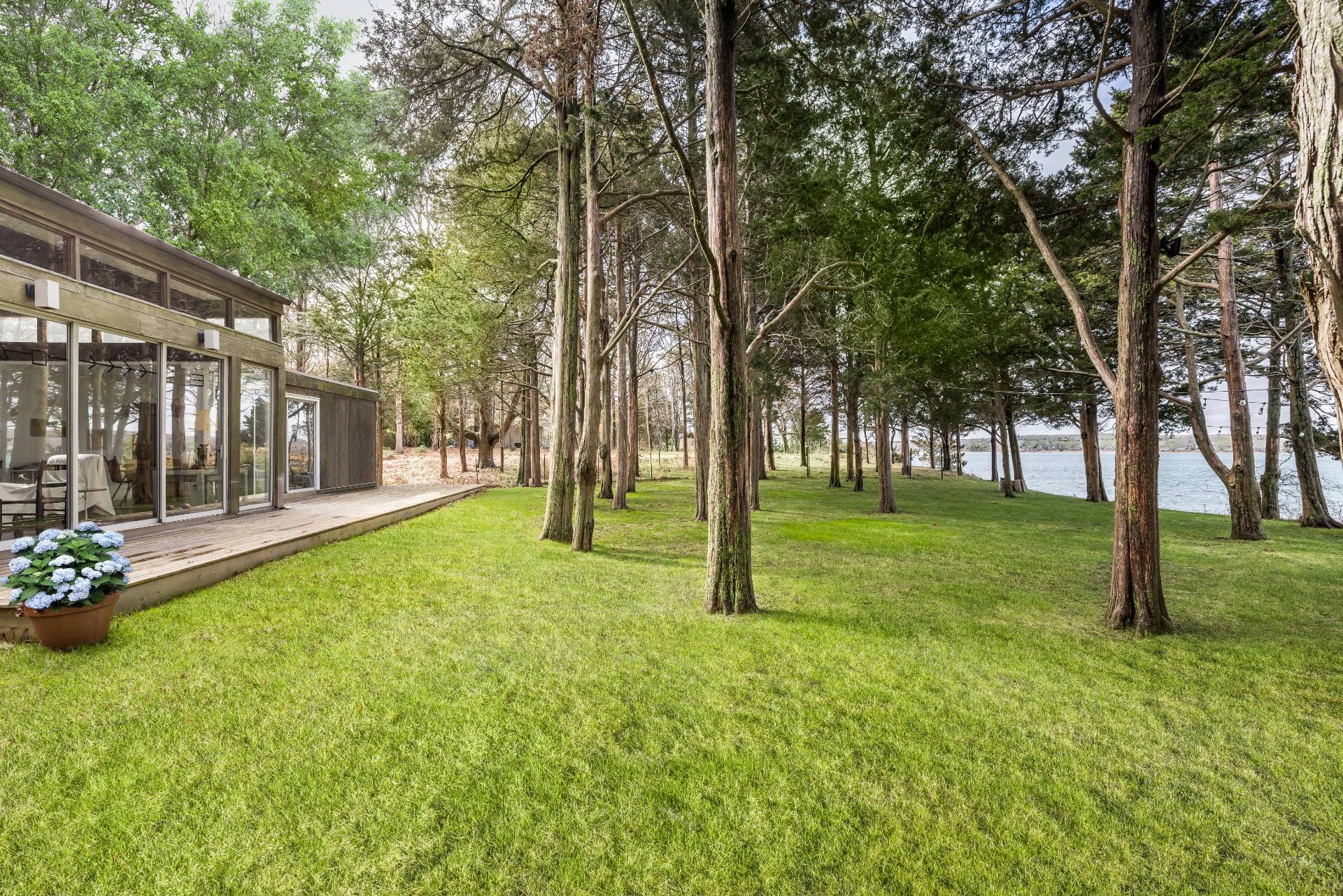 291 Three Mile Harbor Road East Hampton, NY 11937 - Photo 4 of 17 a view of a trees with a yard