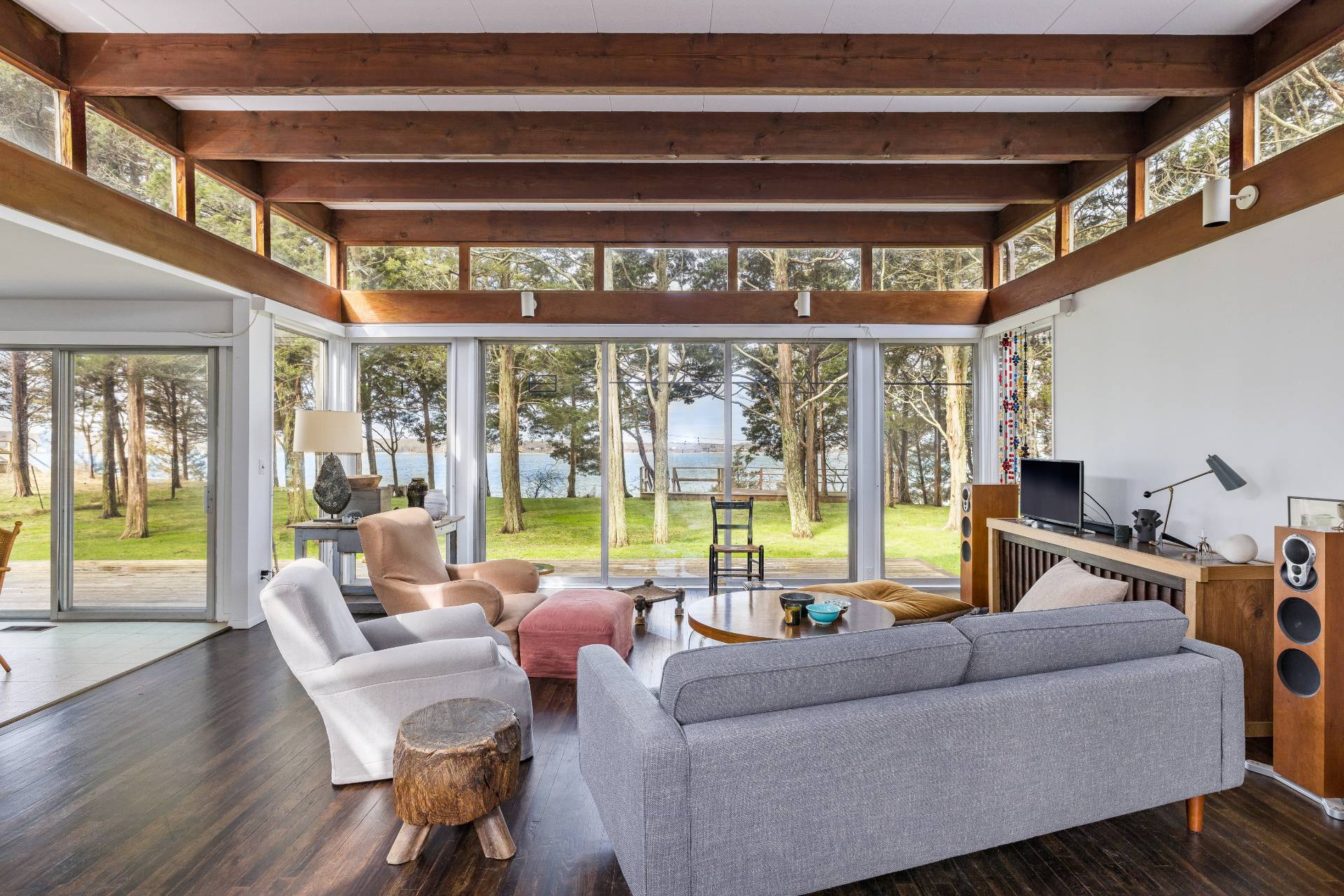 291 Three Mile Harbor Road East Hampton, NY 11937 - Photo 5 of 17 a living room with furniture and a large window