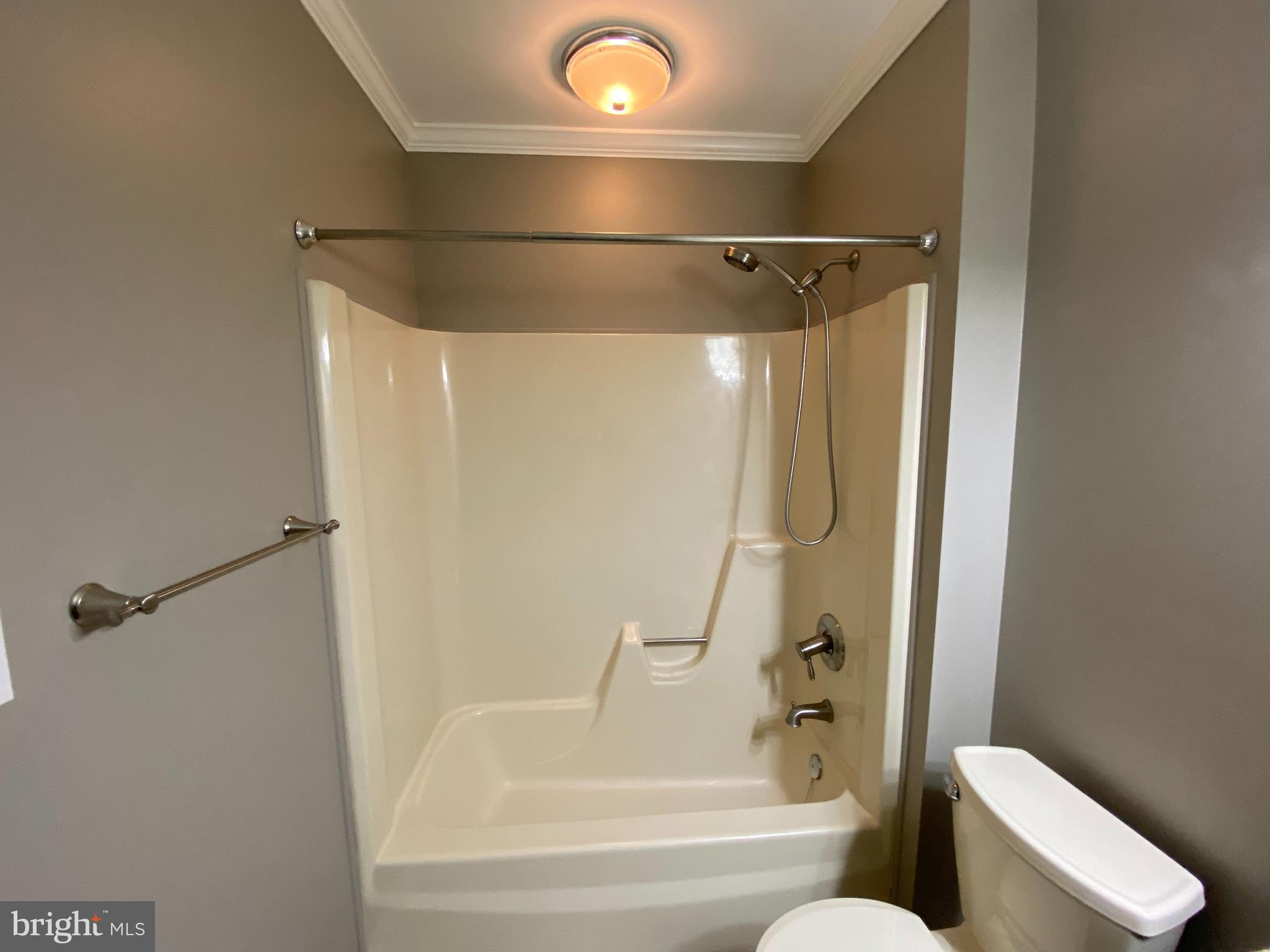 4 Victoria Square Frederick, MD 21702 - Photo 23 of 38 a bathroom with a shower and a toilet