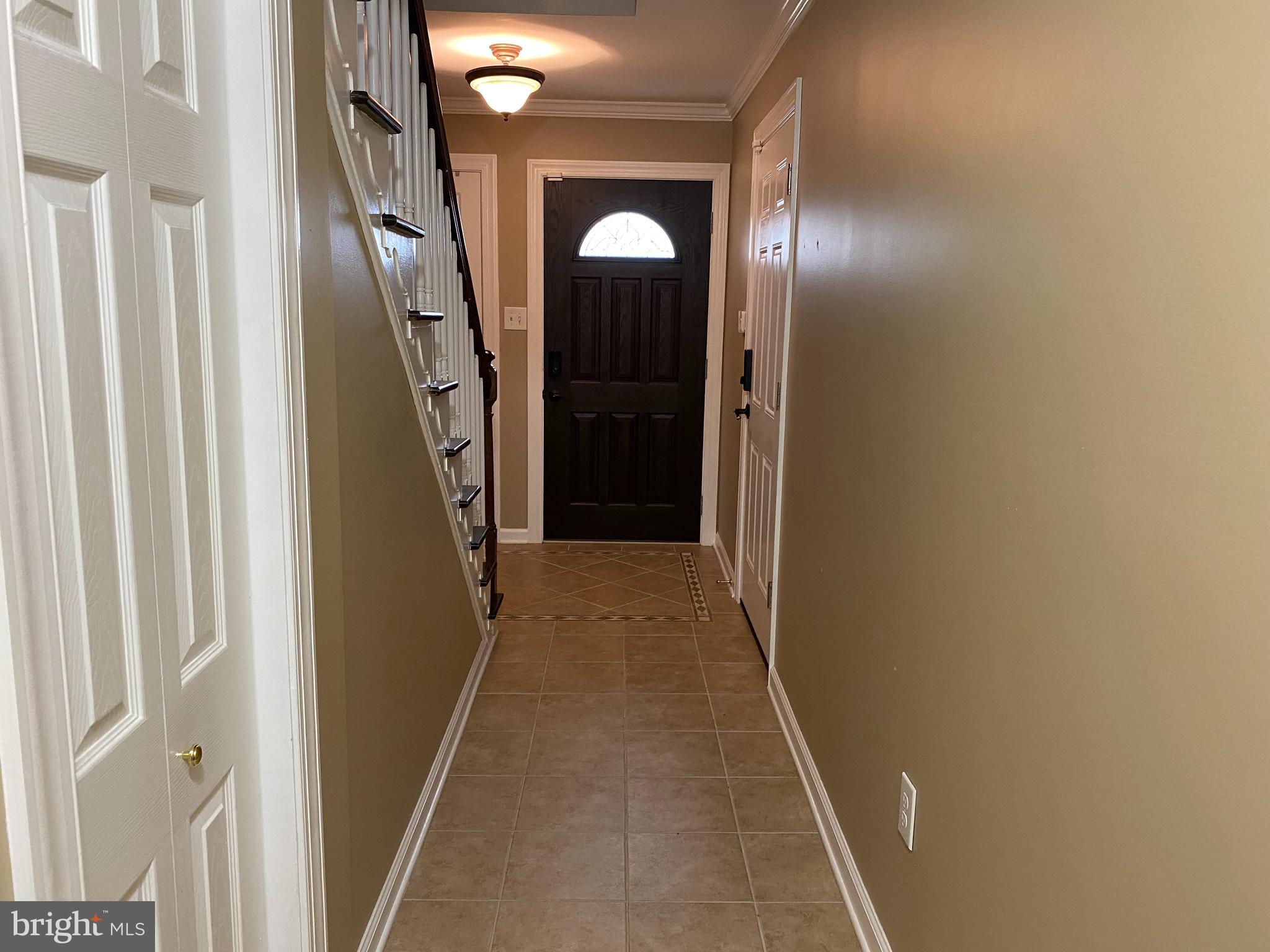 4 Victoria Square Frederick, MD 21702 - Photo 31 of 38 a view of a hallway with wooden floor