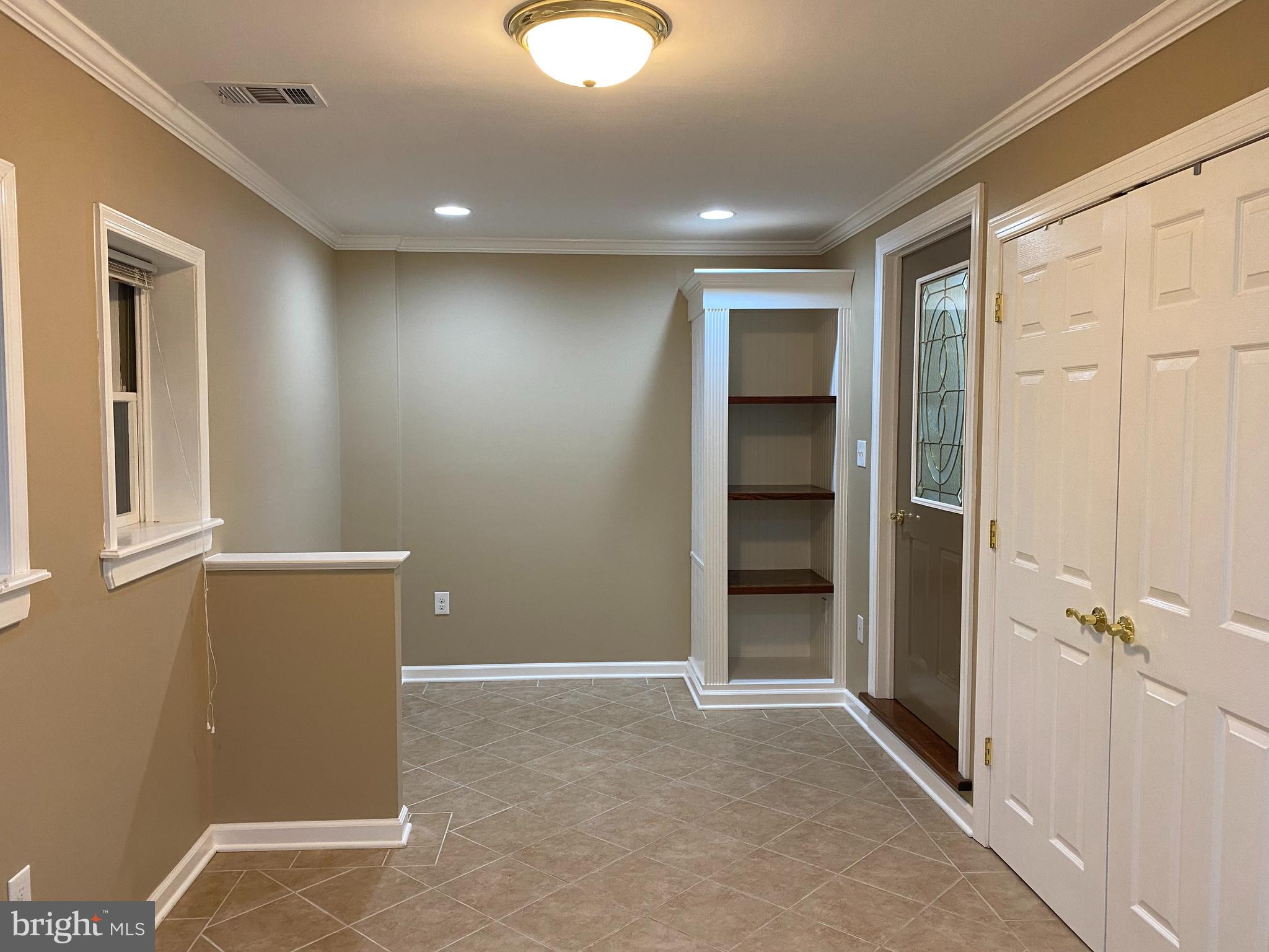 4 Victoria Square Frederick, MD 21702 - Photo 33 of 38 an empty room with closet and a window