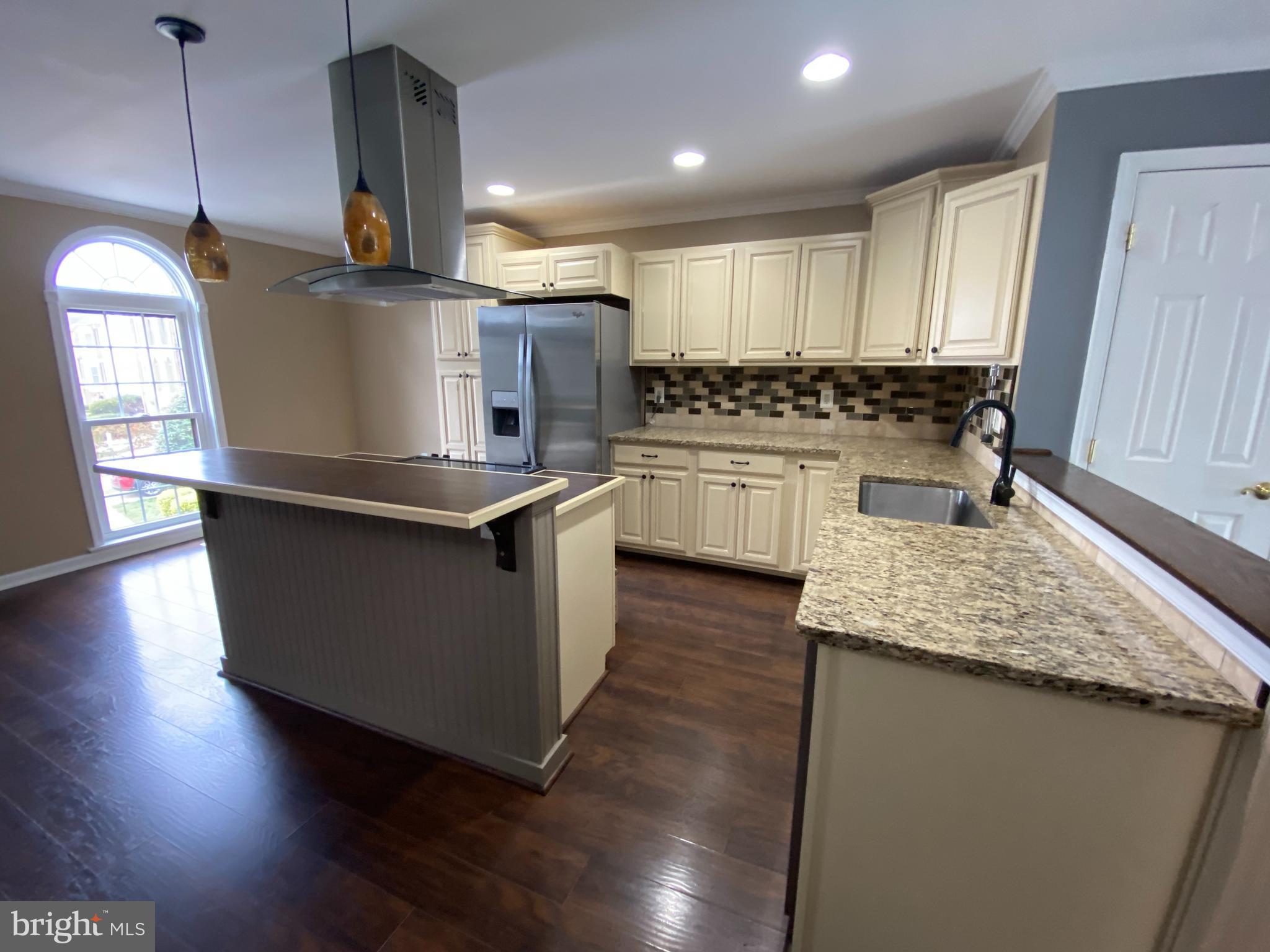 4 Victoria Square Frederick, MD 21702 - Photo 7 of 38 a kitchen with counter top space and appliances