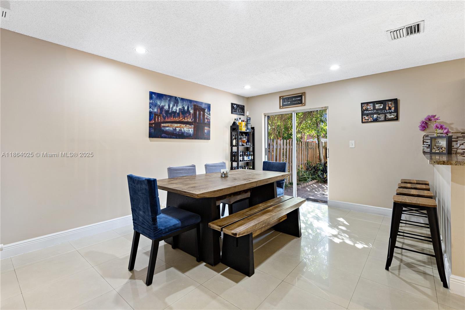 13402 Southwest 153rd Street, Unit 1905 Miami, FL 33177 - Photo 4 of 21 a view of a livingroom with furniture and window