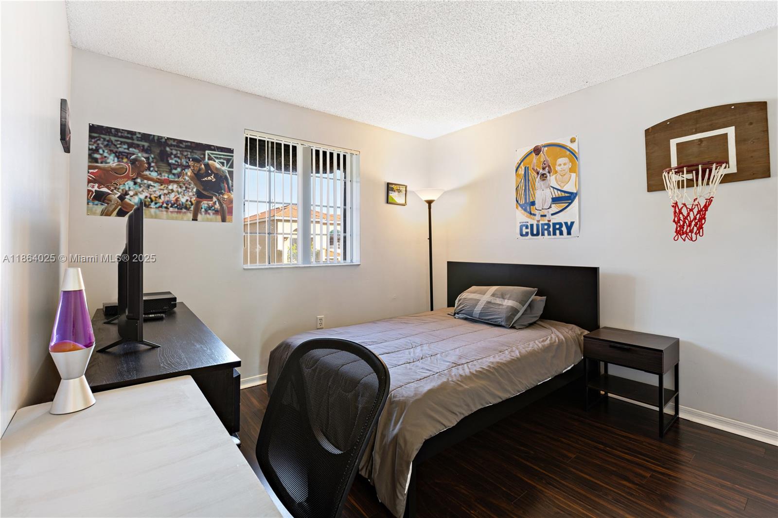 13402 Southwest 153rd Street, Unit 1905 Miami, FL 33177 - Photo 10 of 21 a bedroom with a bed and wooden floor