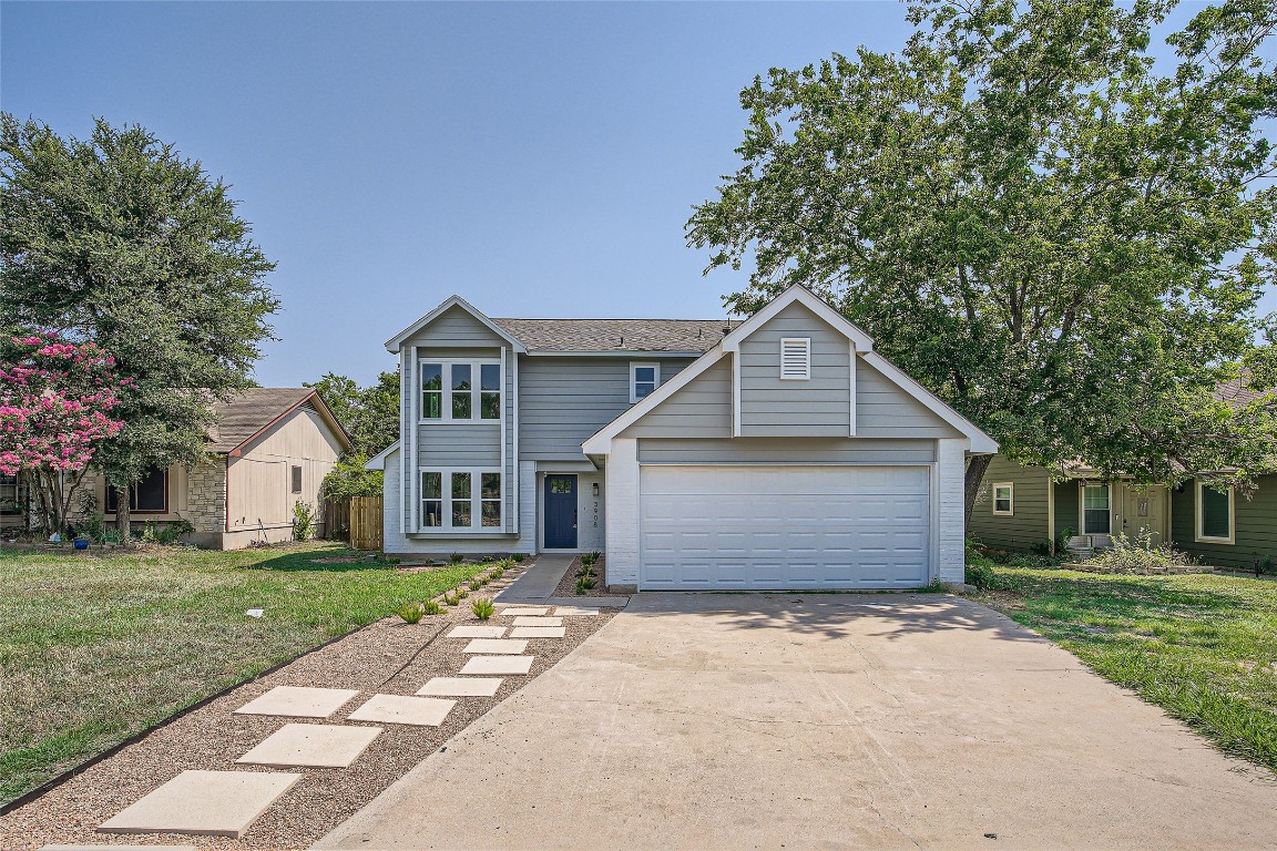 front view of a house and a yard