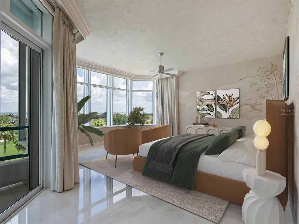 655 Longboat Club Road, Unit 16B Longboat Key, FL 34228 - Photo 17 of 50 a bedroom with furniture and a large window