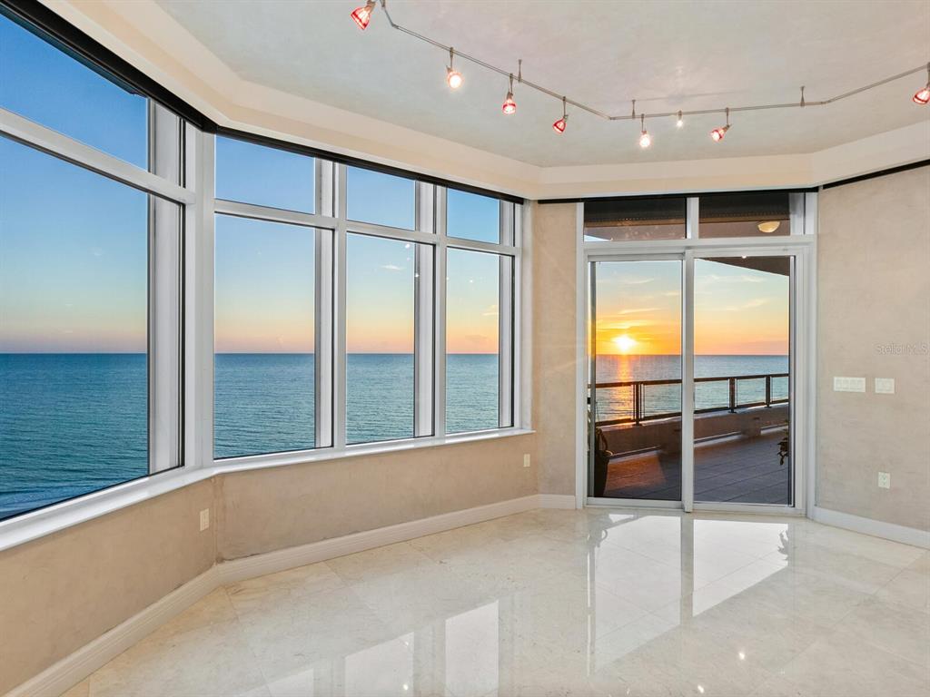 655 Longboat Club Road, Unit 16B Longboat Key, FL 34228 - Photo 41 of 50 a view of an empty room with a window