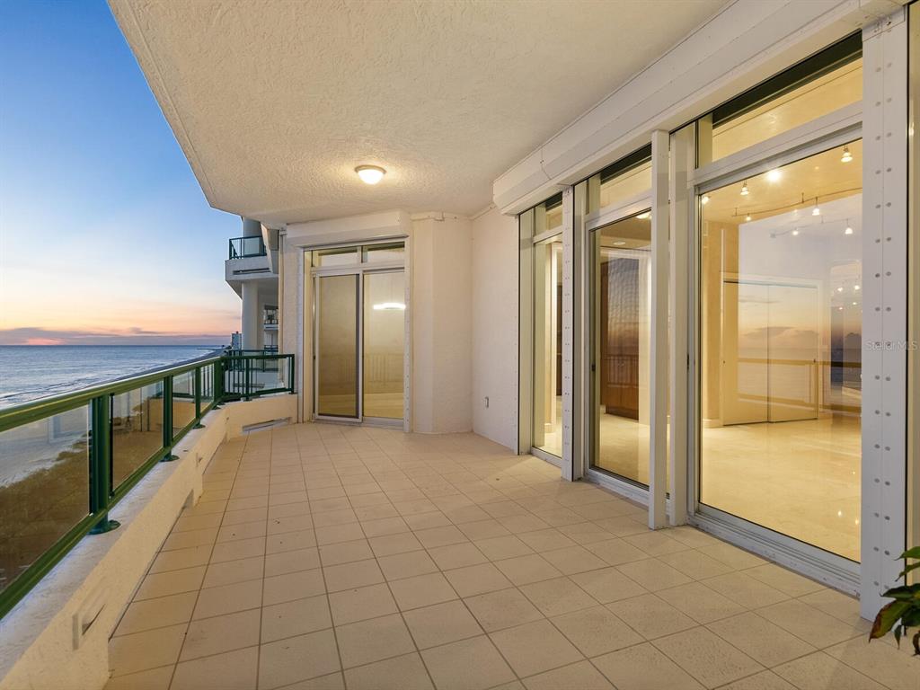655 Longboat Club Road, Unit 16B Longboat Key, FL 34228 - Photo 45 of 50 a view of a hallway with the glass door and an entryway