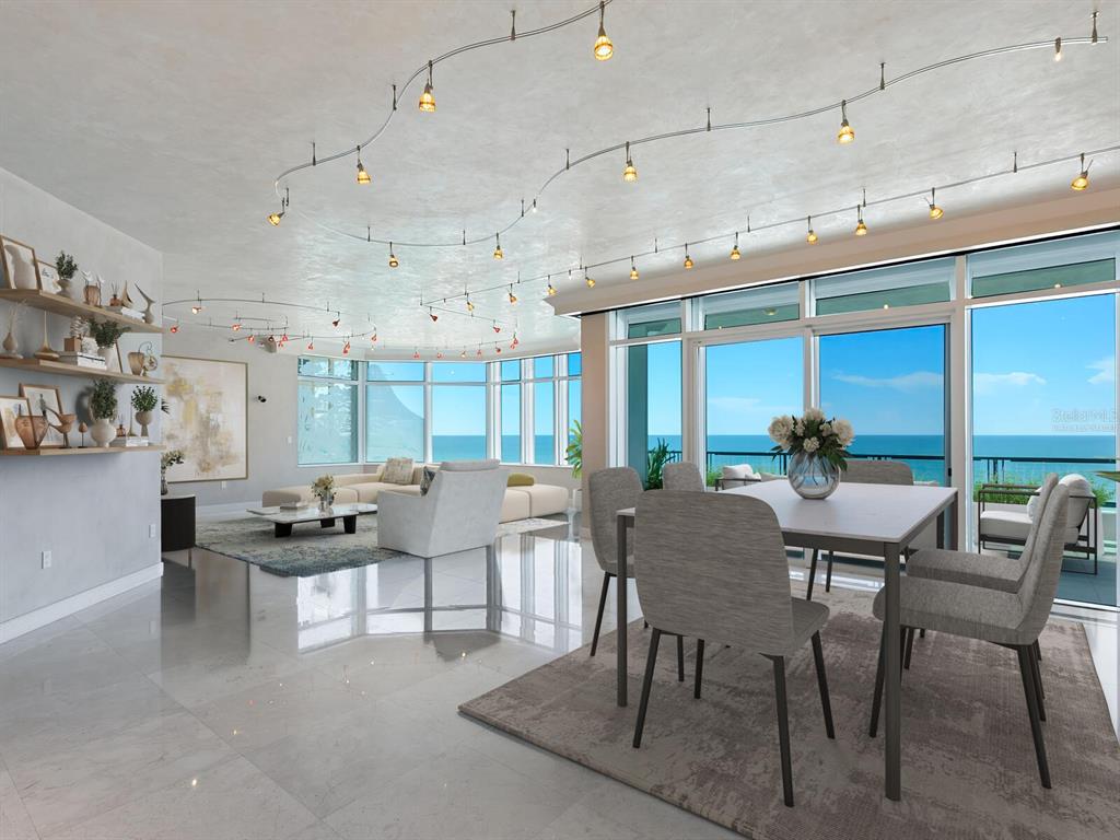655 Longboat Club Road, Unit 16B Longboat Key, FL 34228 - Photo 8 of 50 a view of a dining room with furniture window and outside view