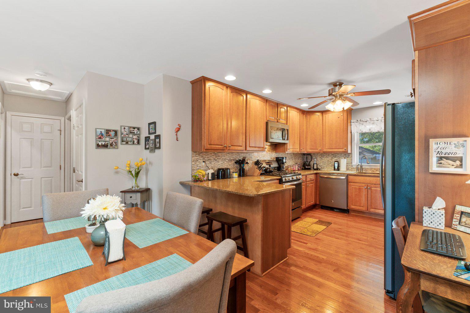 202 Stonewall Road Catonsville, MD 21228 - Photo 13 of 65 Ceiling fan in in-law kitchen * Note HW fls