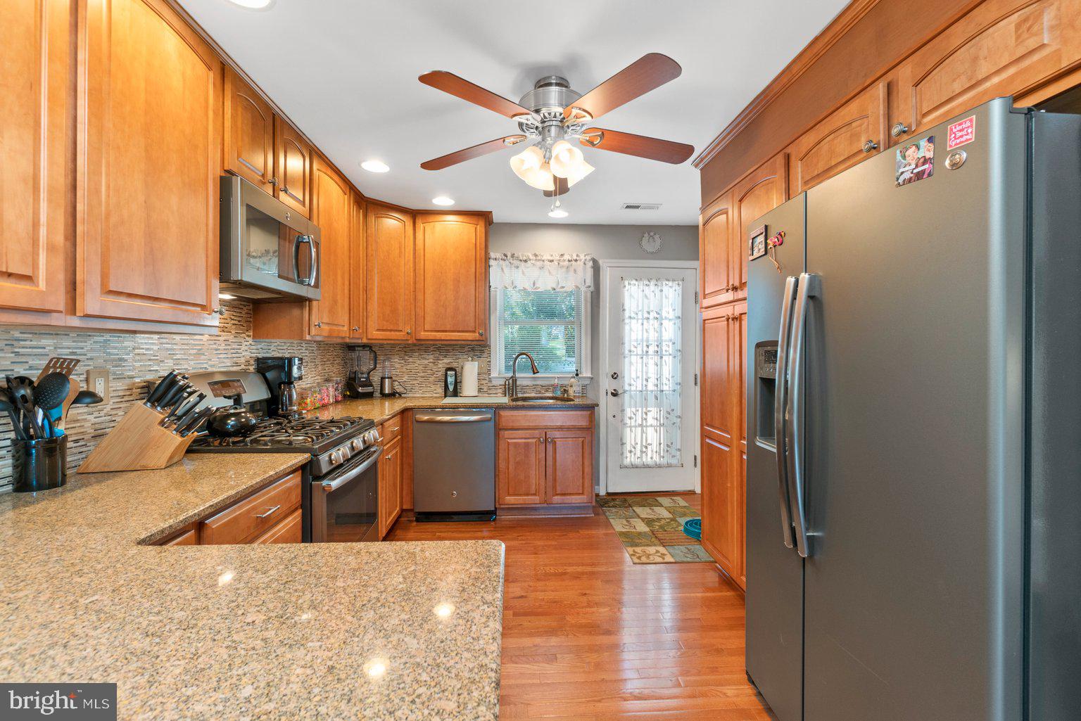 202 Stonewall Road Catonsville, MD 21228 - Photo 15 of 65 Door in In-law area to large deck + to Fam Room