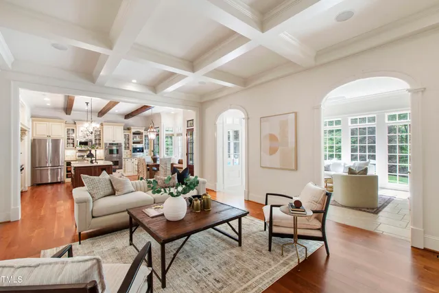 a kitchen with a dining table and chairs