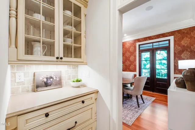 a bathroom with a sink and mirror