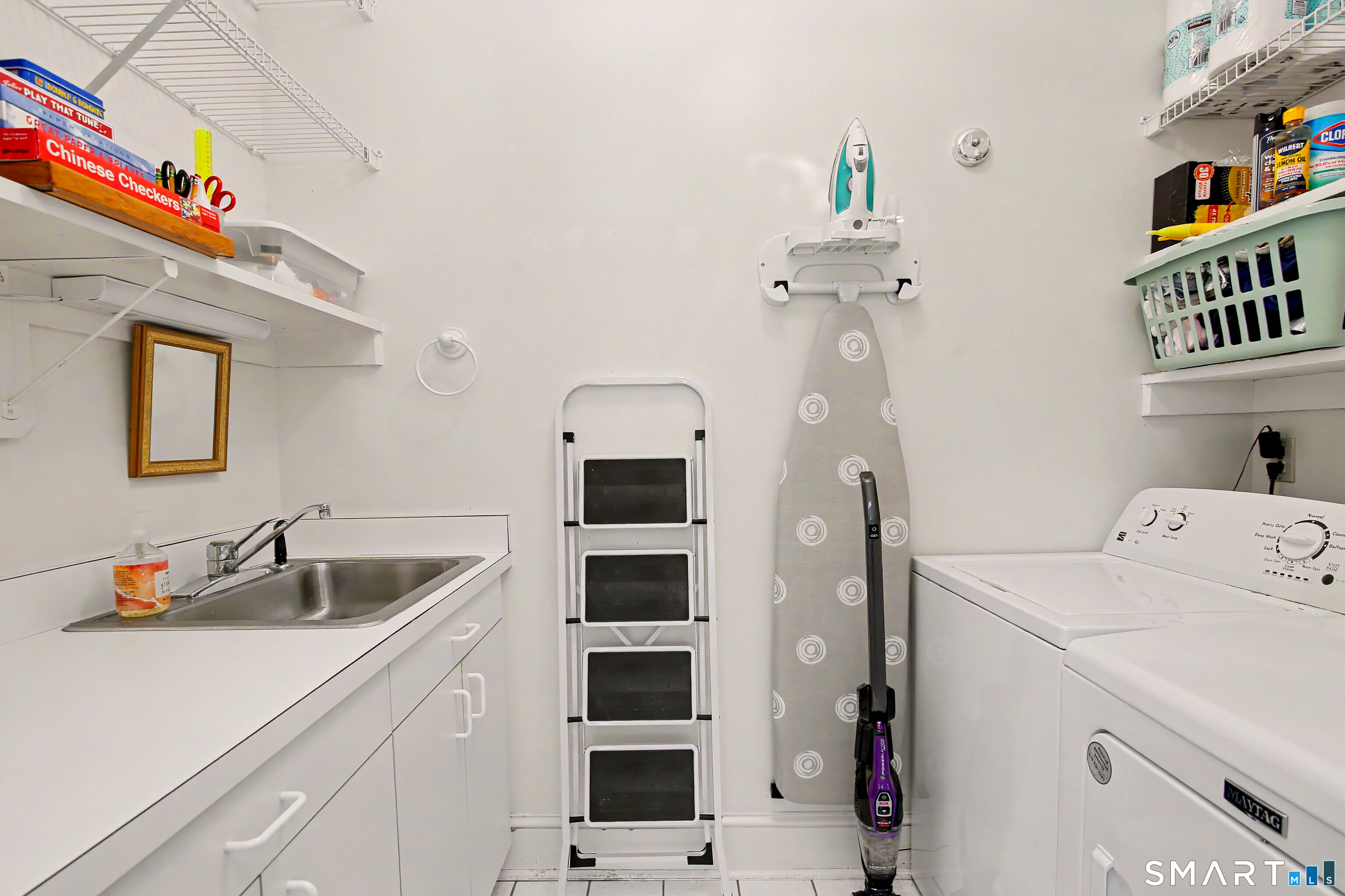 7 Jeremiah Sanford Road Redding, CT 06896 - Photo 13 of 40 Kitchen enjoys a convenient walk-in laundry, pantry and cleaning supply closet.
