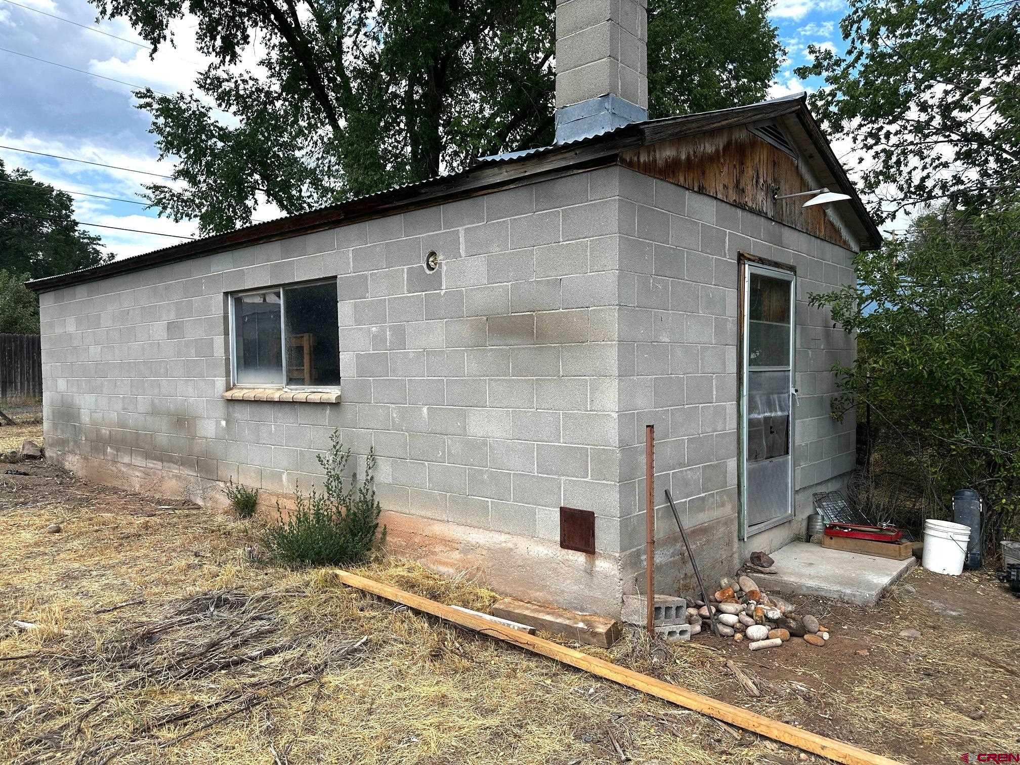 417 South Oak Street Cortez, CO 81321 - Photo 11 of 25 a backyard of a house