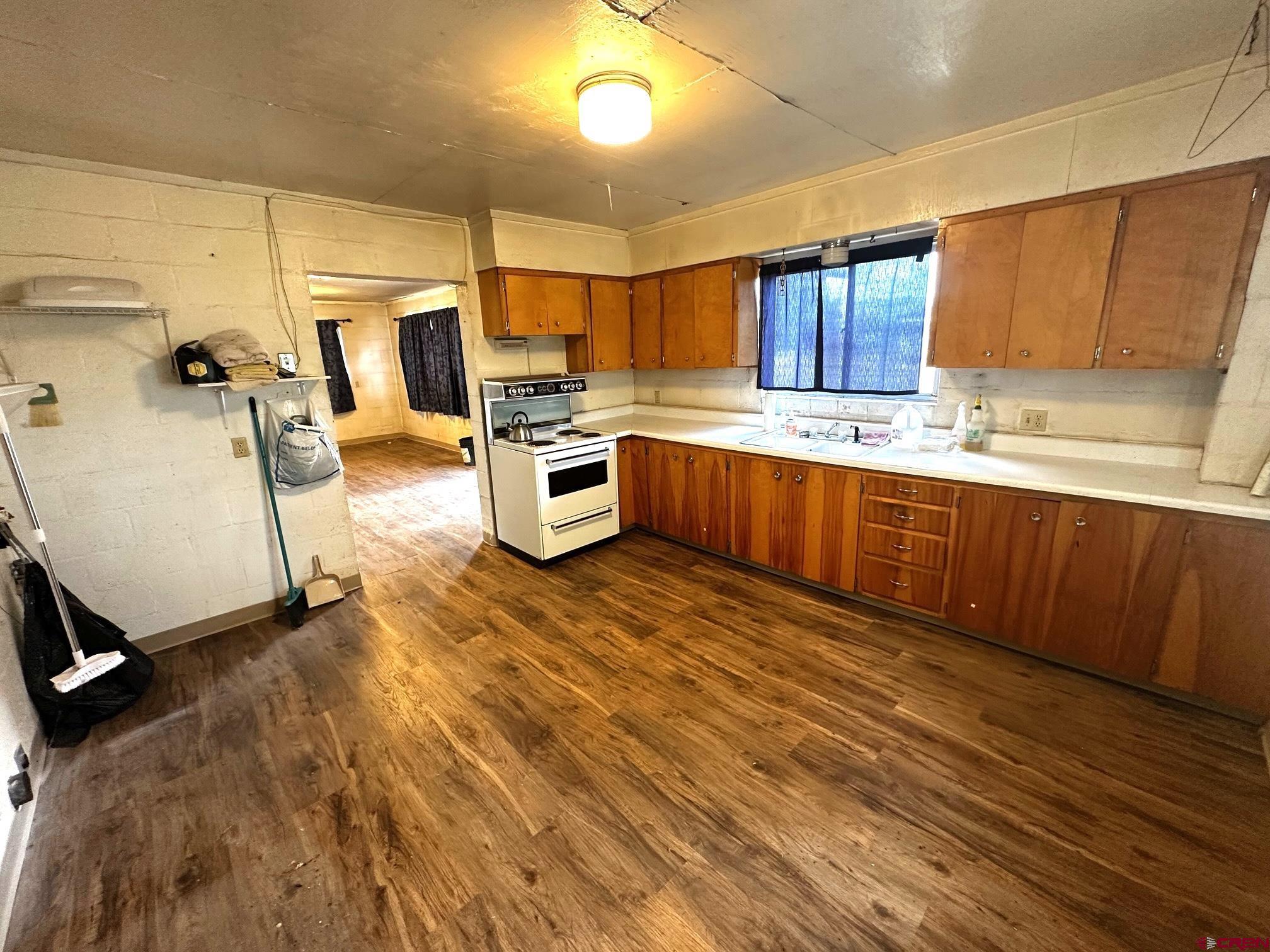 417 South Oak Street Cortez, CO 81321 - Photo 18 of 25 a large kitchen with lot of cabinets
