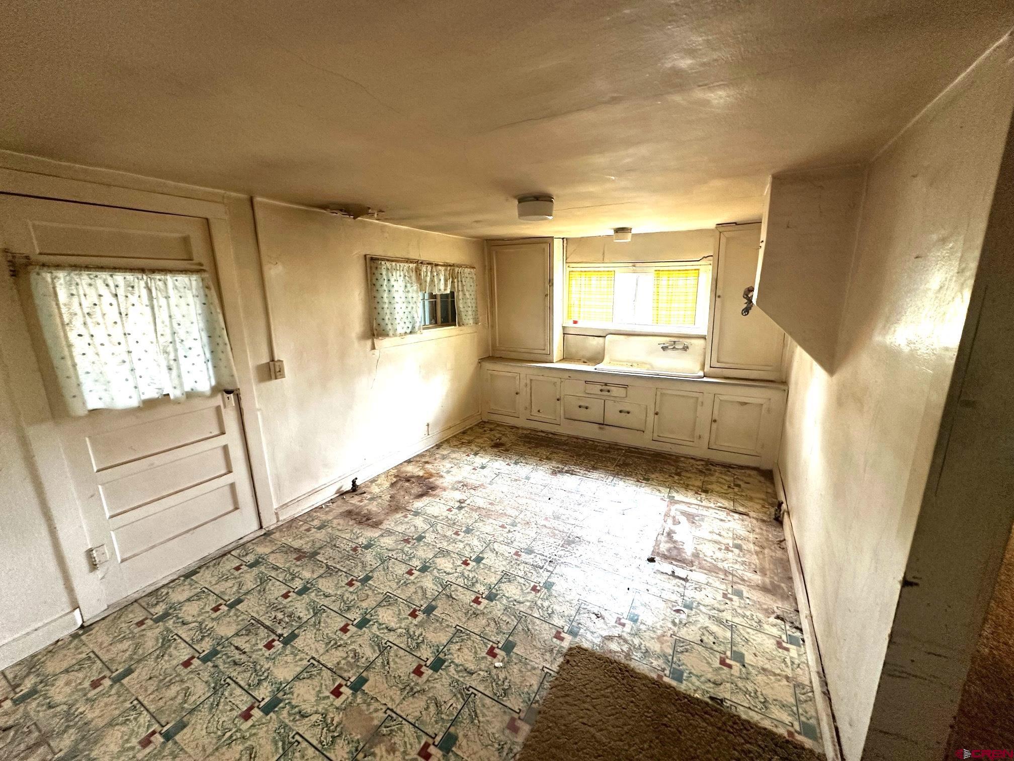 417 South Oak Street Cortez, CO 81321 - Photo 19 of 25 a view of an empty room and window