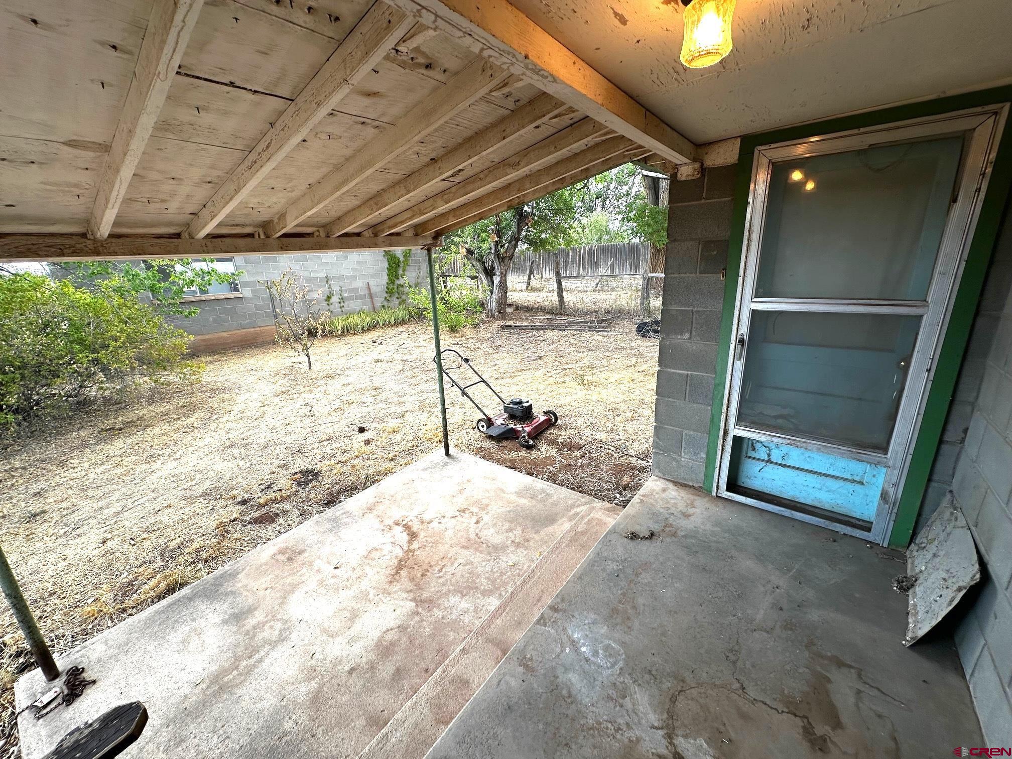 417 South Oak Street Cortez, CO 81321 - Photo 3 of 25 a view of a porch