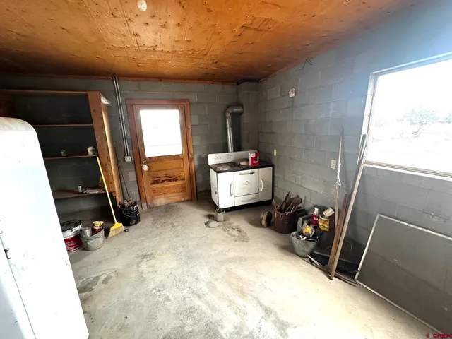 a room with furniture and a window