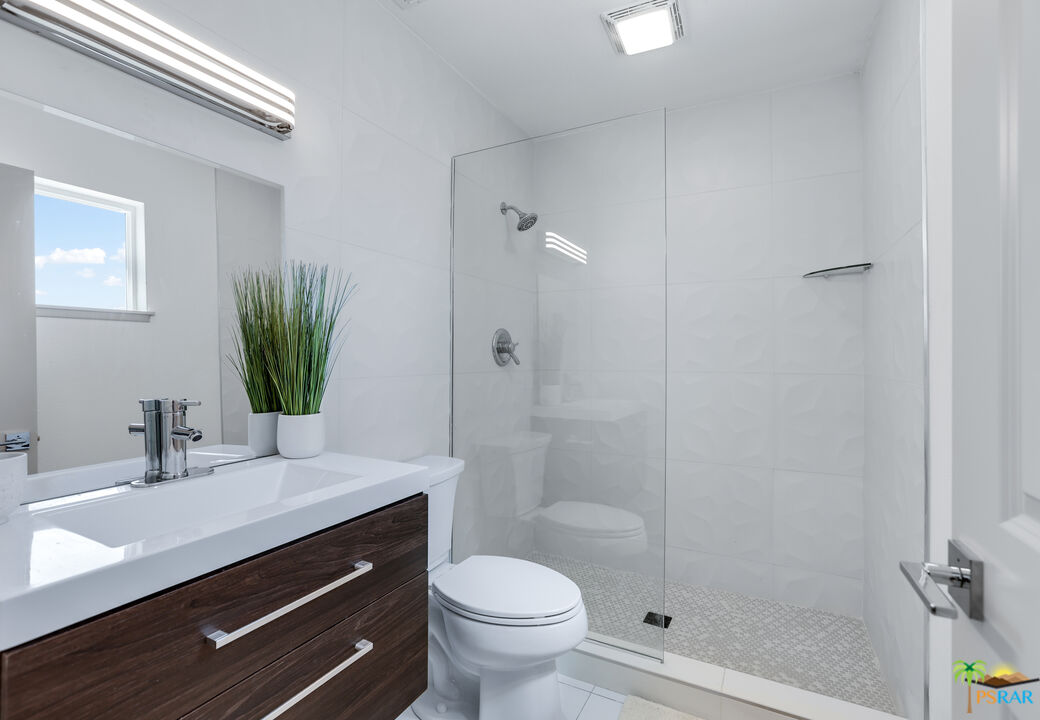 2312 North Blando Road Palm Springs, CA 92262 - Photo 20 of 27 a bathroom with a sink a toilet and shower