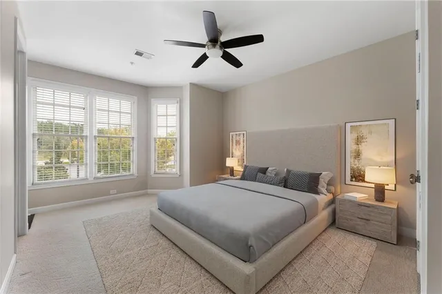 a view of an entryway with wooden floor and a gate