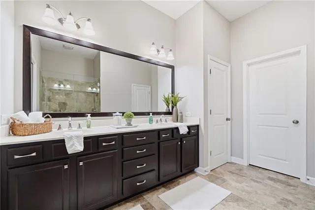 a view of a swimming pool with a chair and tables