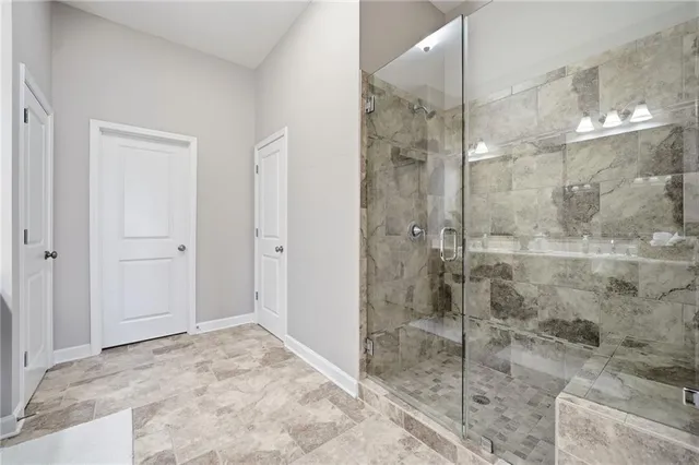 a view of a swimming pool with a chair