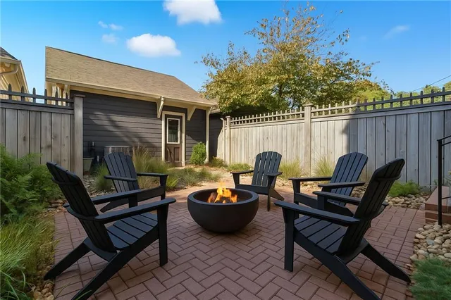 a view of a lounge chair and table in the patio