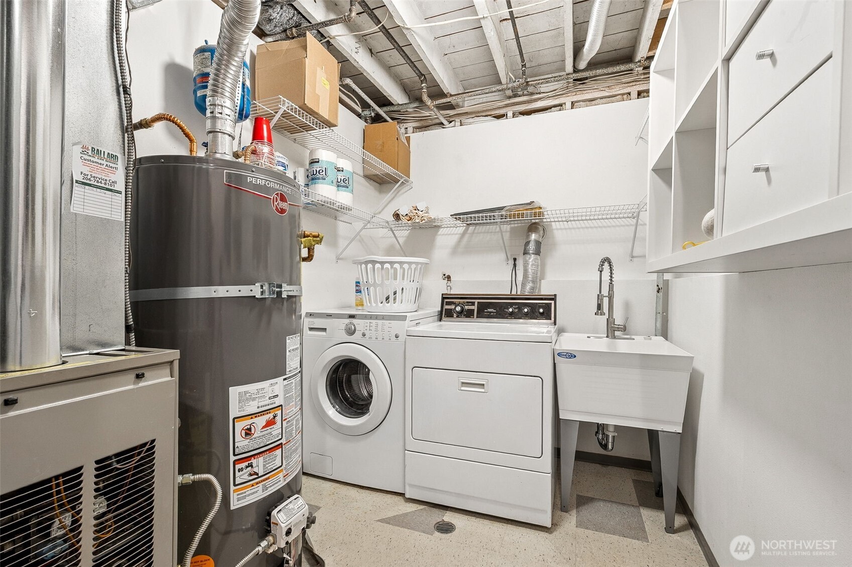 2819 Northwest 68th Street Seattle, WA 98117 - Photo 27 of 39 a utility room with dryer and washer
