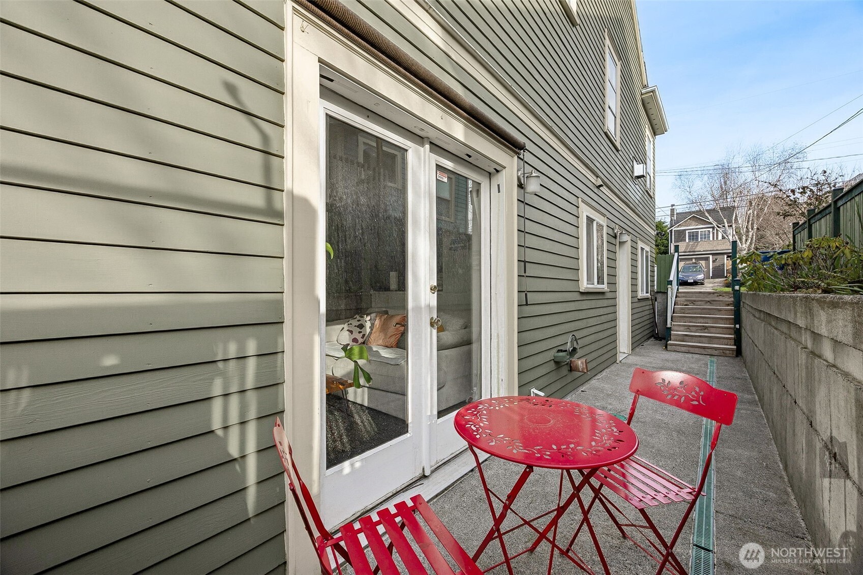 2819 Northwest 68th Street Seattle, WA 98117 - Photo 29 of 39 a view of a chairs and table in the balcony