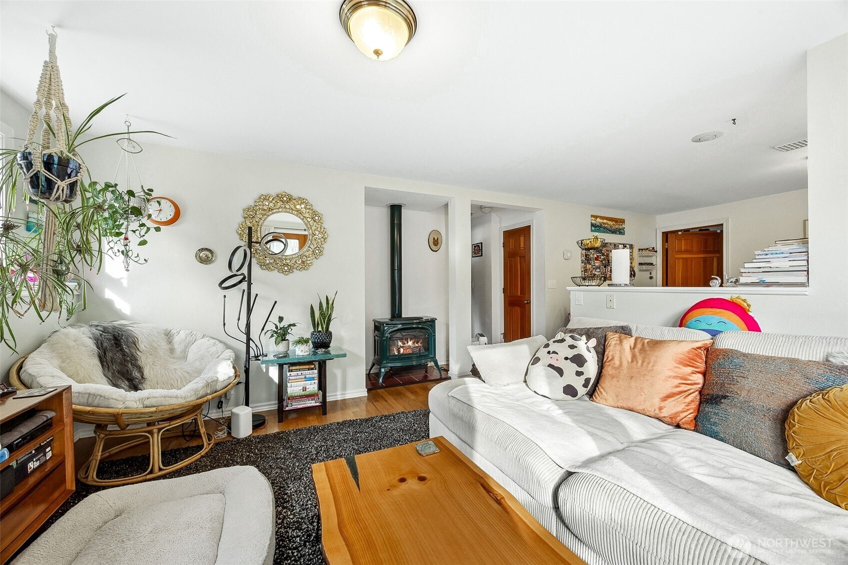 2819 Northwest 68th Street Seattle, WA 98117 - Photo 31 of 39 a living room with furniture and wooden floor