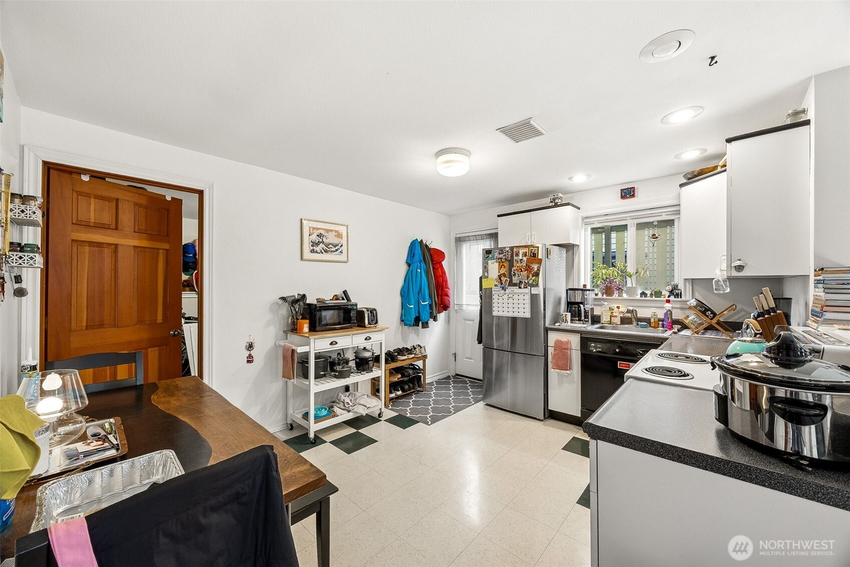 2819 Northwest 68th Street Seattle, WA 98117 - Photo 33 of 39 a view of a kitchen with workspace and a window