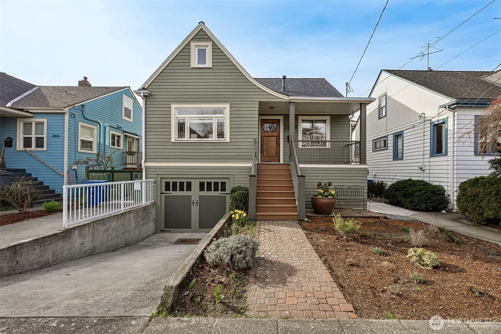 2819 Northwest 68th Street Seattle, WA 98117 - Photo 39 of 39 a front view of a house with a yard