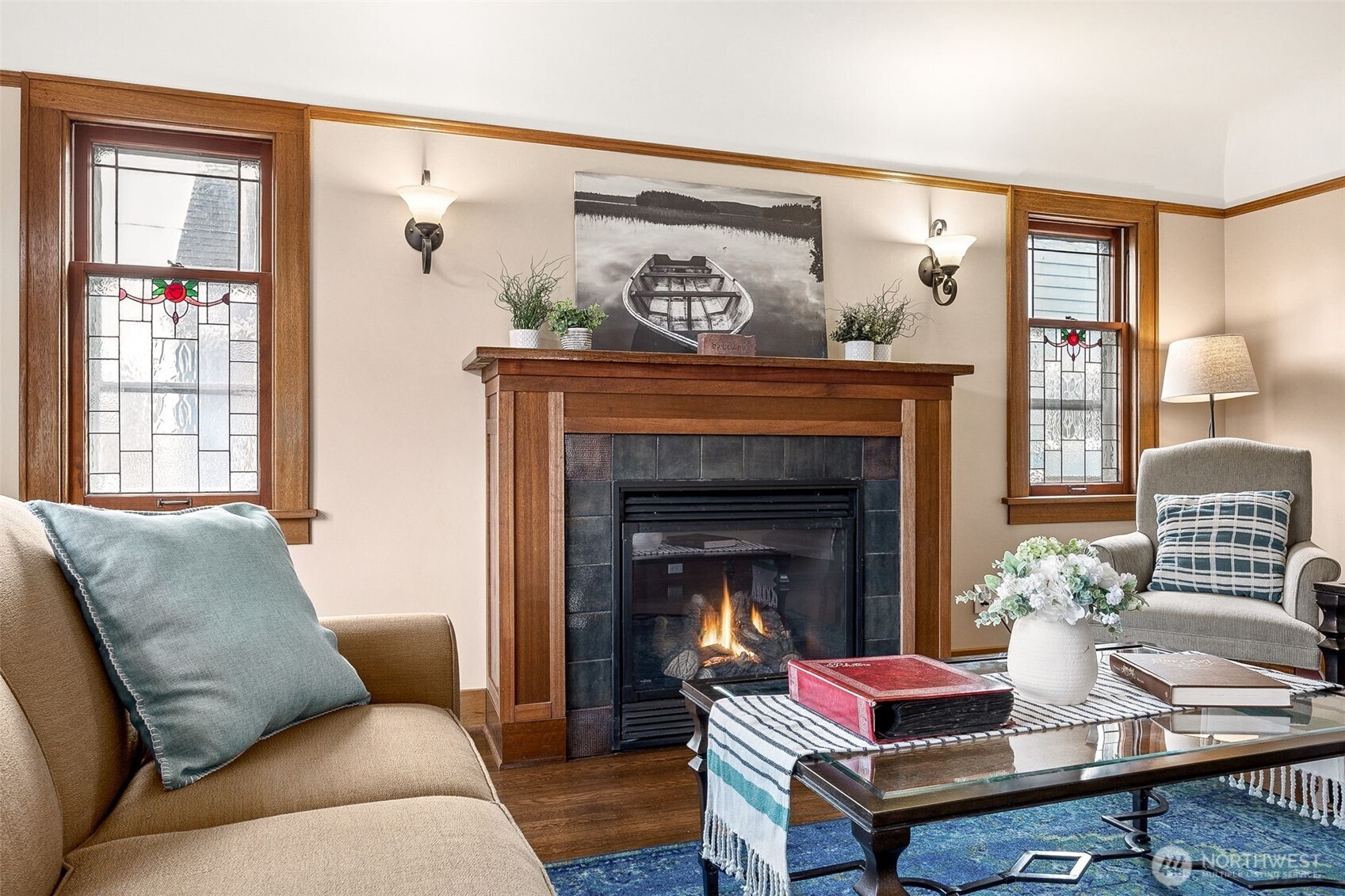 2819 Northwest 68th Street Seattle, WA 98117 - Photo 5 of 39 a living room with furniture and a fireplace