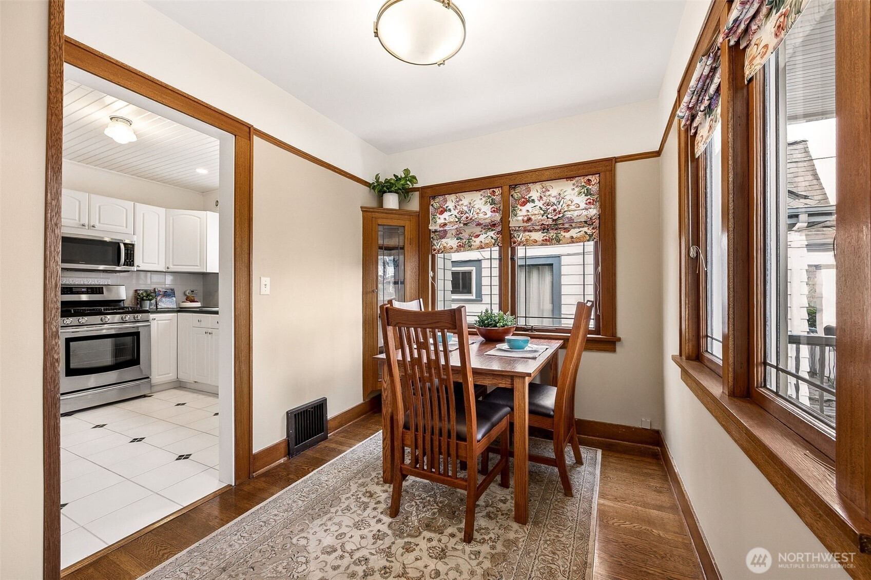 2819 Northwest 68th Street Seattle, WA 98117 - Photo 8 of 39 a view of a dining room with furniture window and outside view