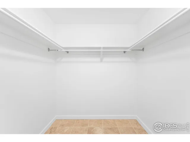 a view of a kitchen with an empty space and kitchen view