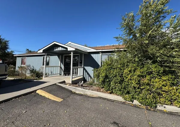 front view of a house with yard