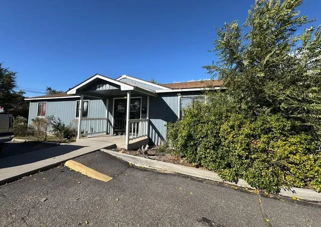 front view of a house with yard
