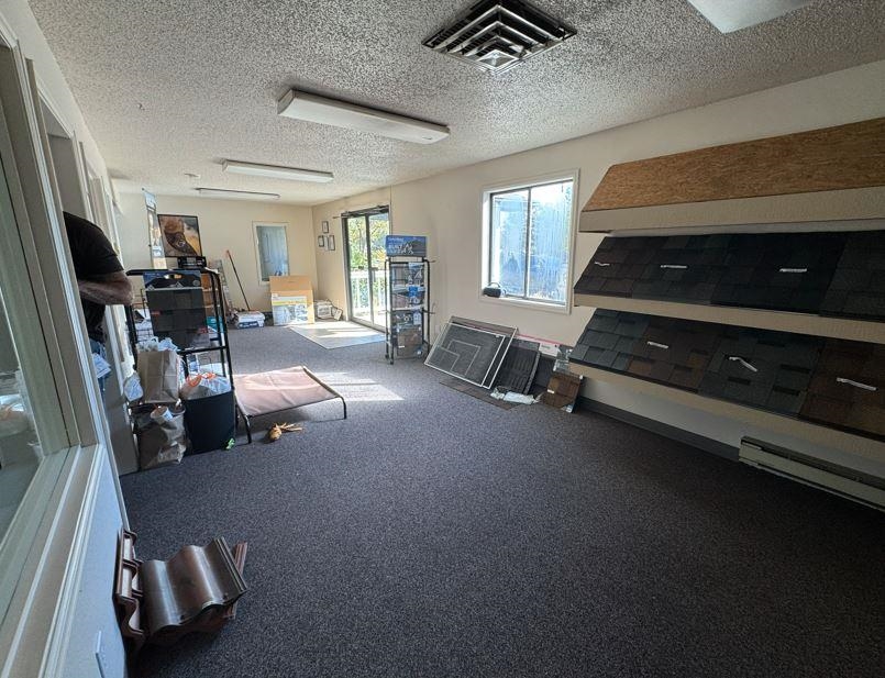 2718 Patterson Road Grand Junction, CO 81506 - Photo 10 of 13 a living room with furniture and a window