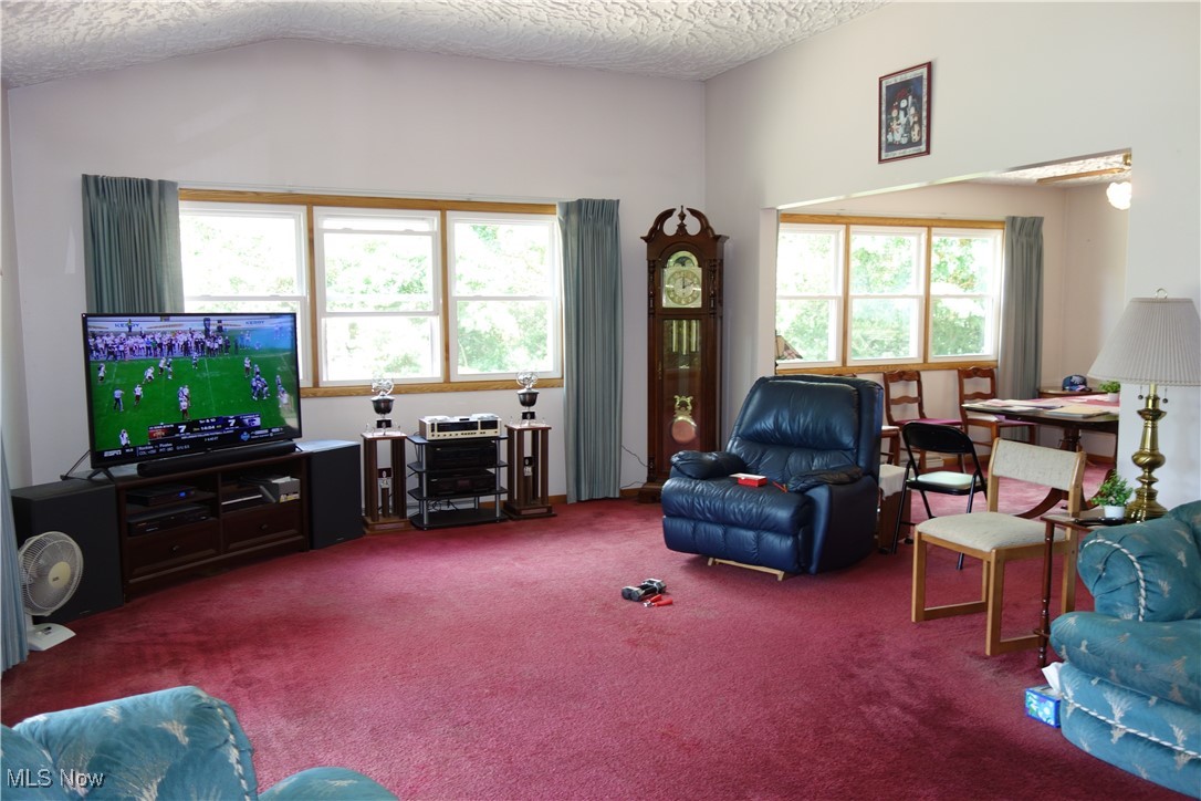4943 Mayfair Road Green, OH 44720 - Photo 13 of 47 Living room w/ High ceilings and an amazing view