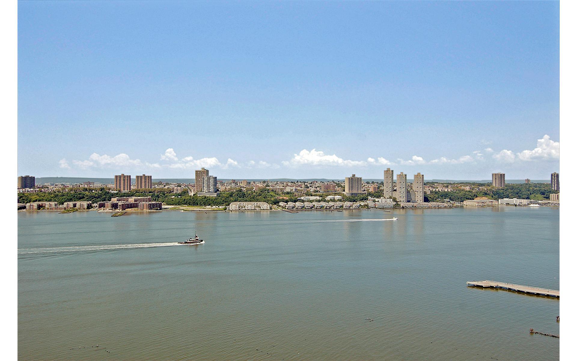100 Riverside Boulevard, Unit 31B Manhattan, NY 10069 - Photo 5 of 17 a view of a lake with a city