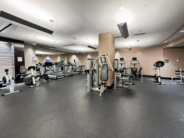 a view of a room with gym equipment