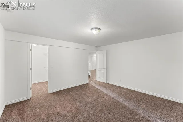 a view of small space with racks on the wall