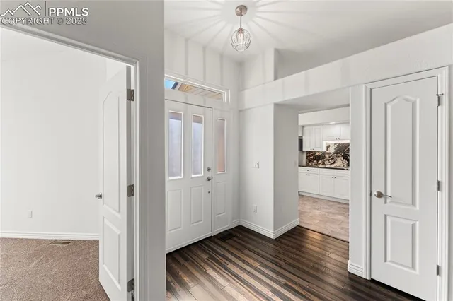 a view of a livingroom with wooden floor