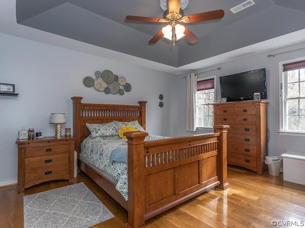 22161 Rowanty Road Carson, VA 23830 - Photo 17 of 27 a bedroom with a bed and a flat screen tv