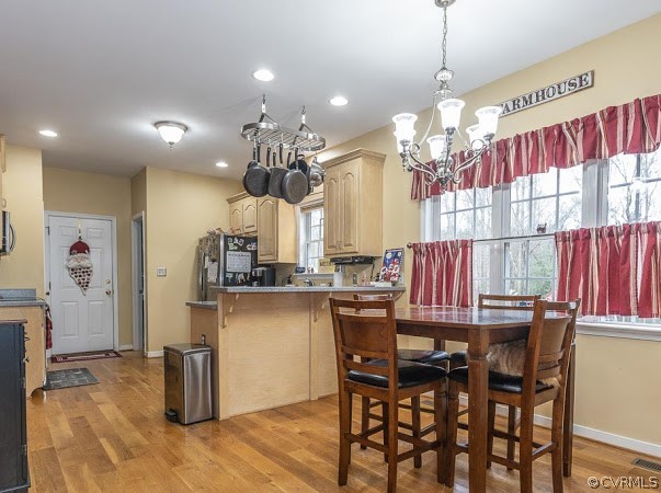 22161 Rowanty Road Carson, VA 23830 - Photo 8 of 27 a view of a dining room with furniture window and wooden floor