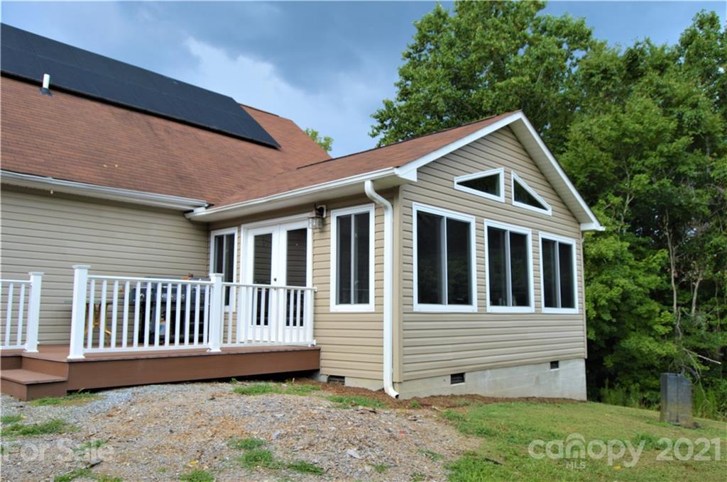 10835 Cool Springs Road Woodleaf, NC 27054 - Photo 2 of 35 a view of a house with a yard