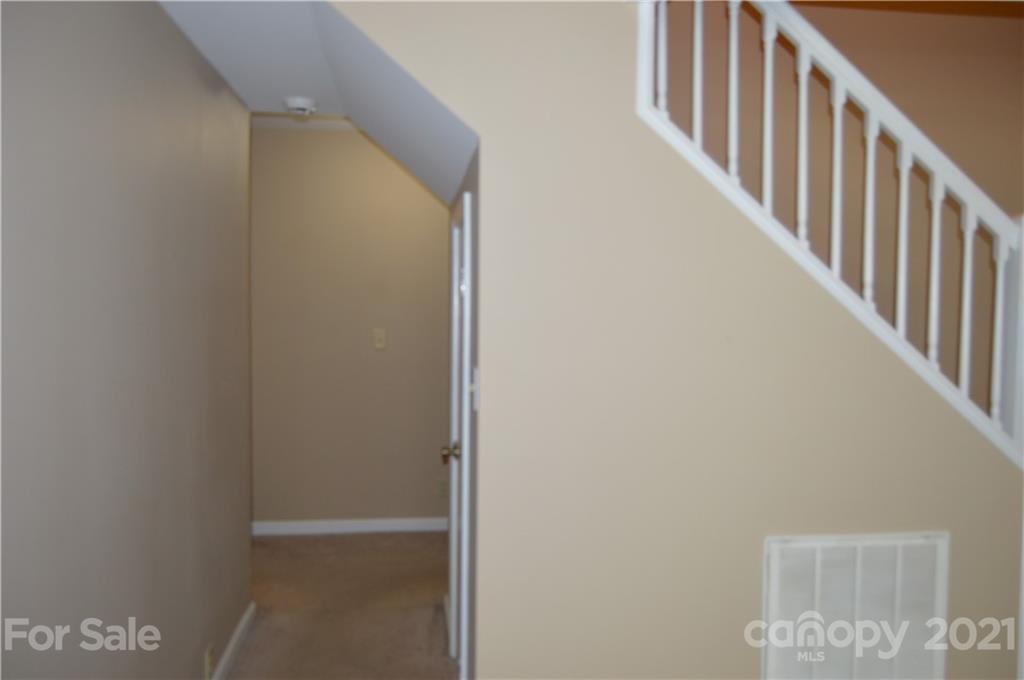 10835 Cool Springs Road Woodleaf, NC 27054 - Photo 13 of 35 a view of staircase with railing and white walls